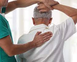 Physiotherapist at home in Delhi for lower back pain.